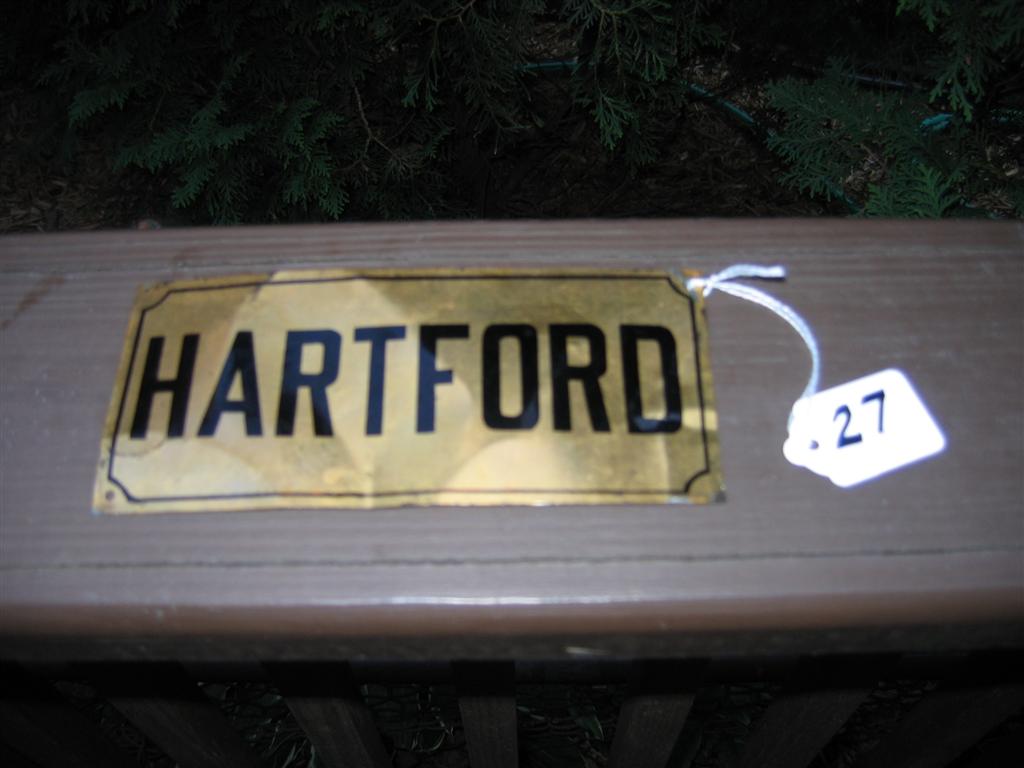 "Hartford". Tin 3 1/8" x 6 7/8 ". Bent in some spo
