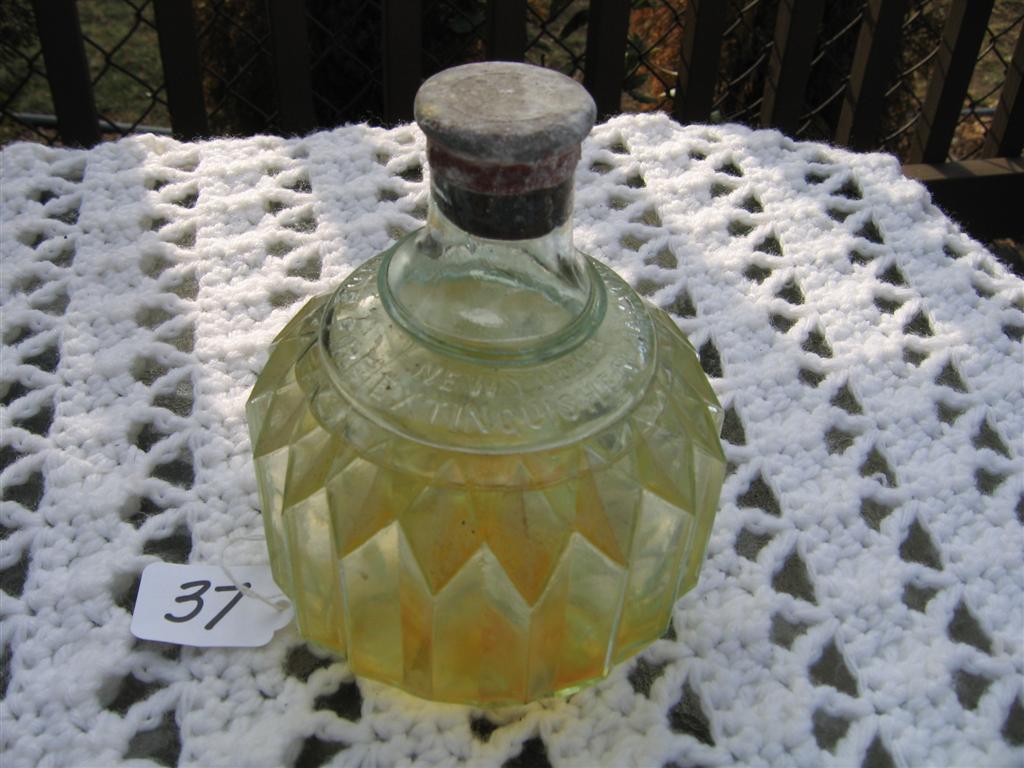 Clear Glass Hayward Hand Grenade. Two Thirds Full