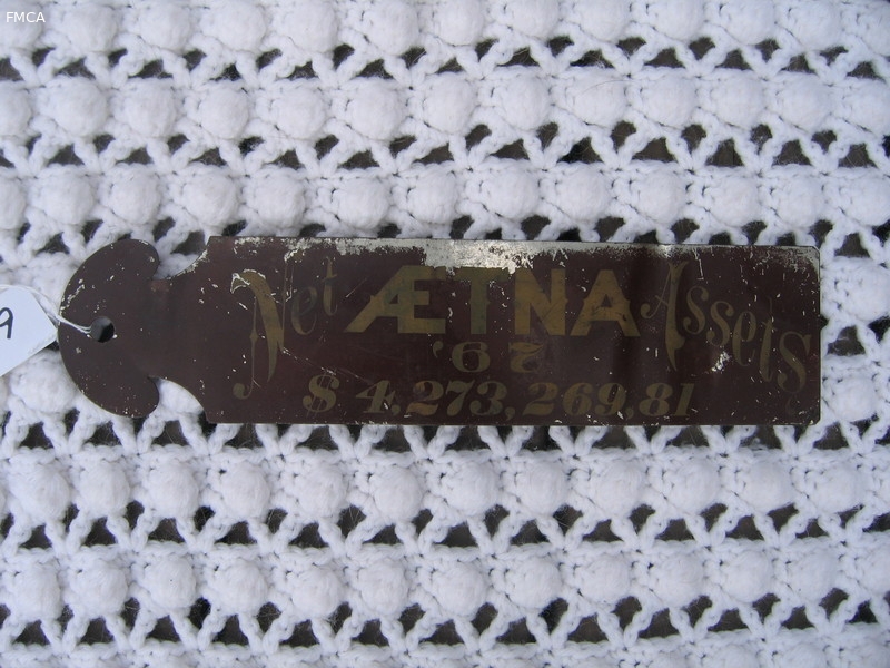 Aetna Ledger Marker. One side says Net Assets AET