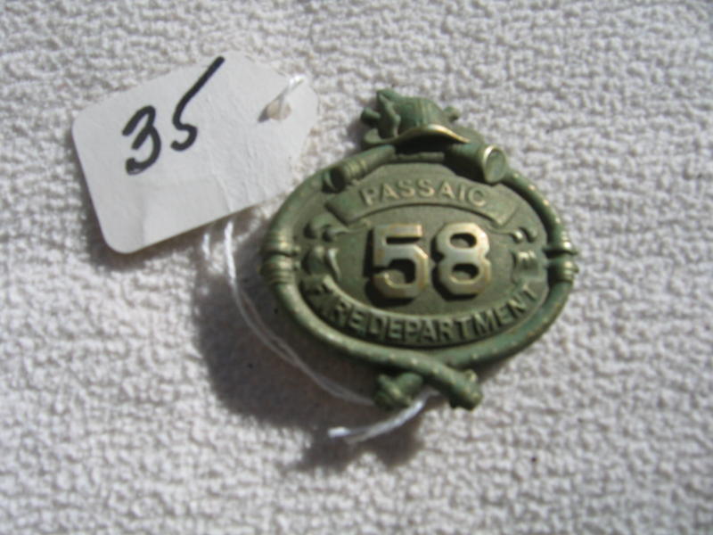 Passaic Fire Department Uniform Badge. Number 58.