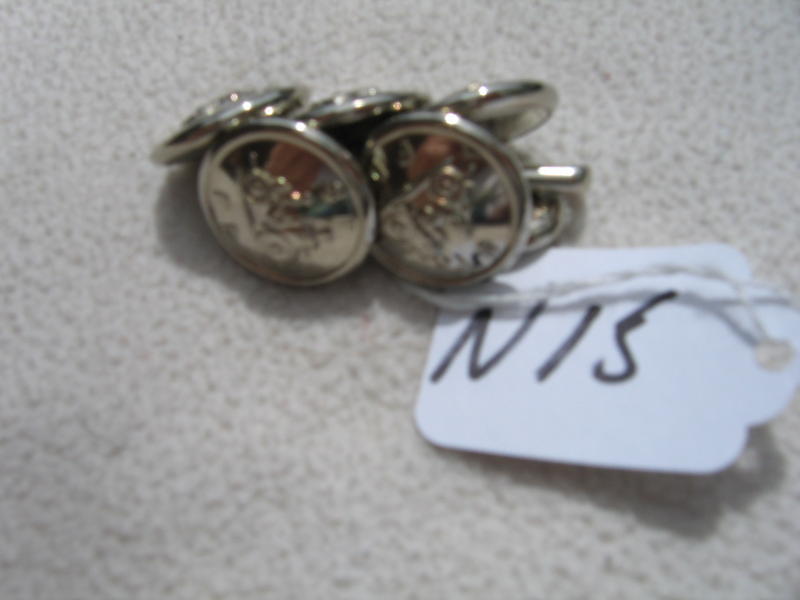 Silver Colored Buttons. Five Regular Size and One