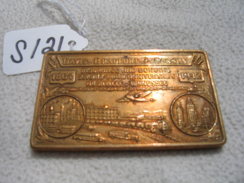 Paperweight. Gold Color. Raised Etching on one s