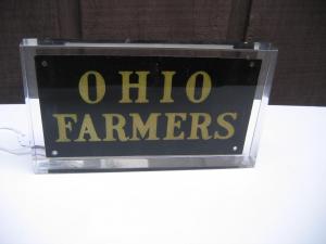 #176 Ohio Farmers Fire Mark in a Lucite protector.