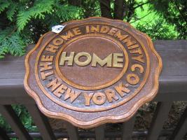 Plaque. The Home Indemnity Co. New York. 11 1/2"