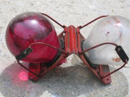 Duel Glass Grenades - one red (with liquid), one w