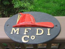M F Di Co. Reproduction Fire Mark. Red Fire Helme