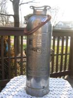 Fire Extinguisher. Metal. 23 1/2 tall. Rough Ri