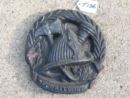 Plaque. Fire Helmet in center with F.D. 9 on shie