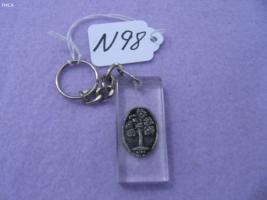 Green Tree Key Chain. The Mark is encased in Luci