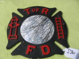 Mirror set up to be hung. On outside of mirror is