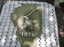 Sign. Shape of Illinois. Metal. Grey Background