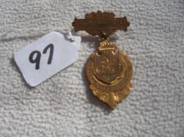 Fireman Pin. Gold Colored. Top says Passaic N.J.