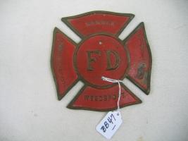 Metal Fire Department Item. Background is Red wit