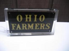 #176 Ohio Farmers Fire Mark in a Lucite protector.